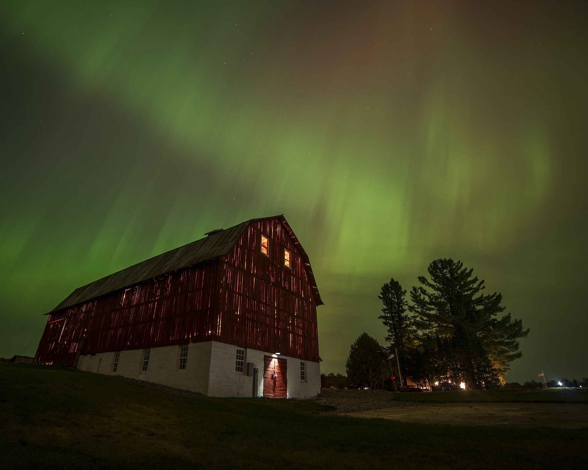 Northern Lights over a barn in Baraga Township
